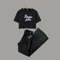 Camiseta negra con estampado Tenga paz y licra negra